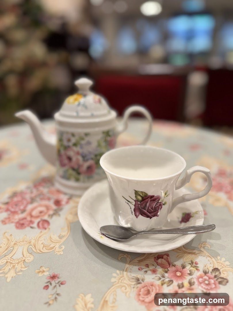 Tea Set on Floral Tablecloth