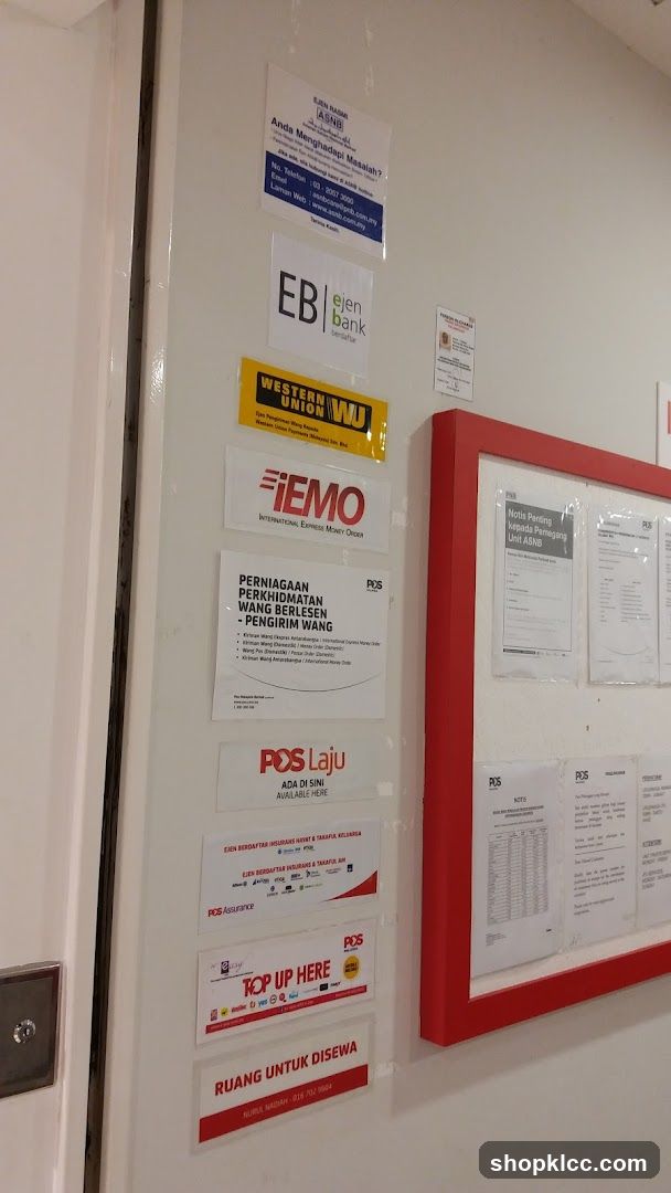 Wall with various notices and logos