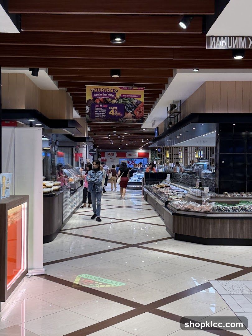 Supermarket aisle with fresh produce and meat displays