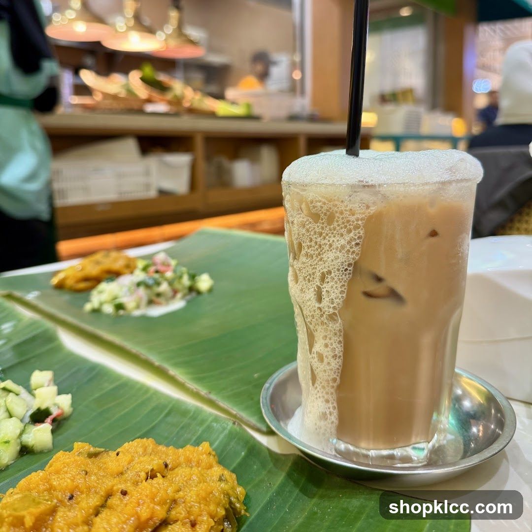 Iced Tea with Food on Banana Leaves