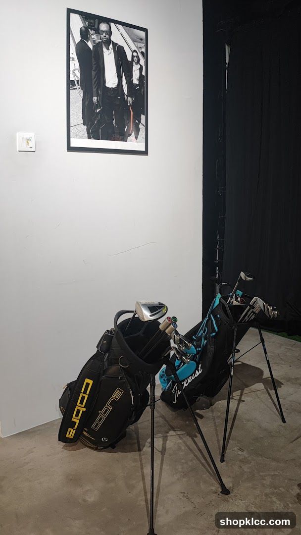 Golf Bags and Framed Photo