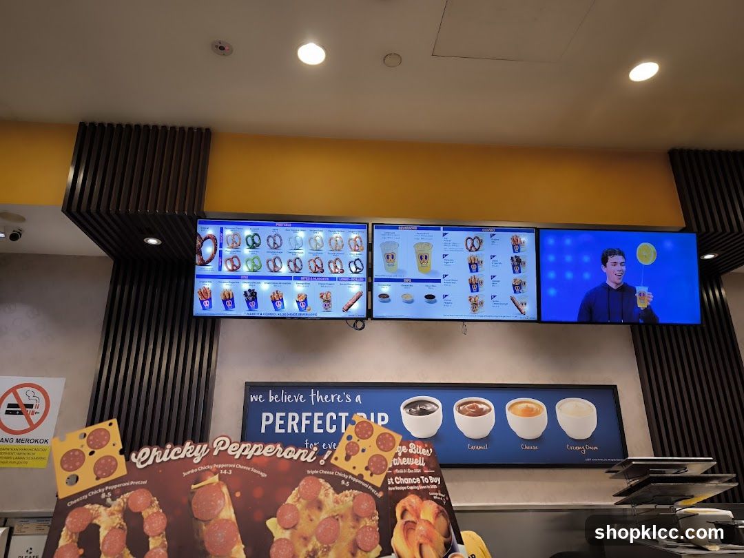 A food establishment's digital menu boards and promotional displays
