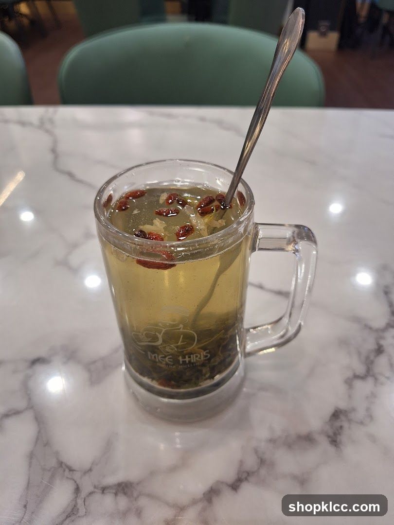 Mug of Herbal Tea with Goji Berries
