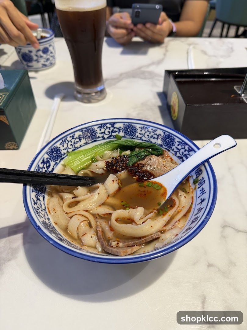 Bowl of Noodles with Broth and Vegetables