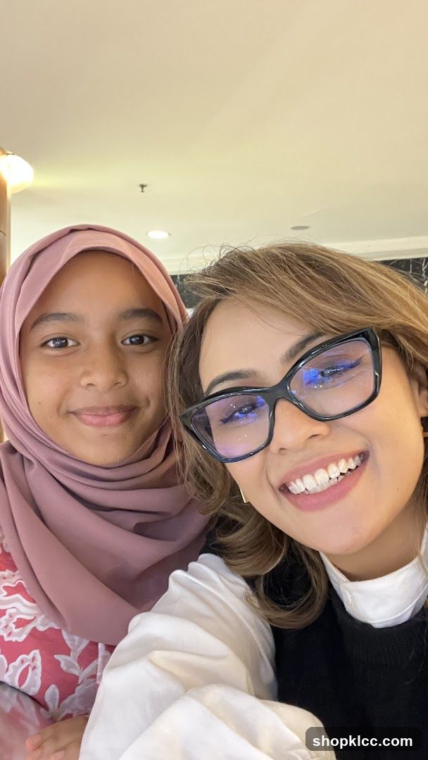 Two smiling women