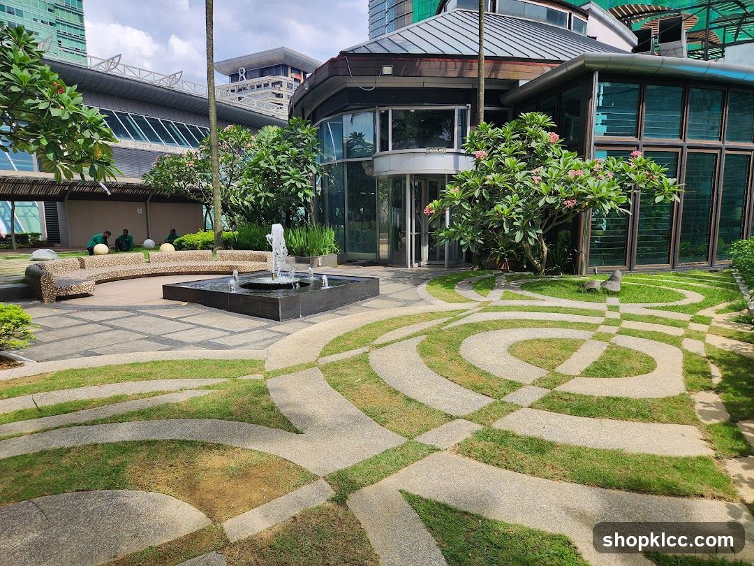 Modern Building Exterior with Fountain and Landscaping