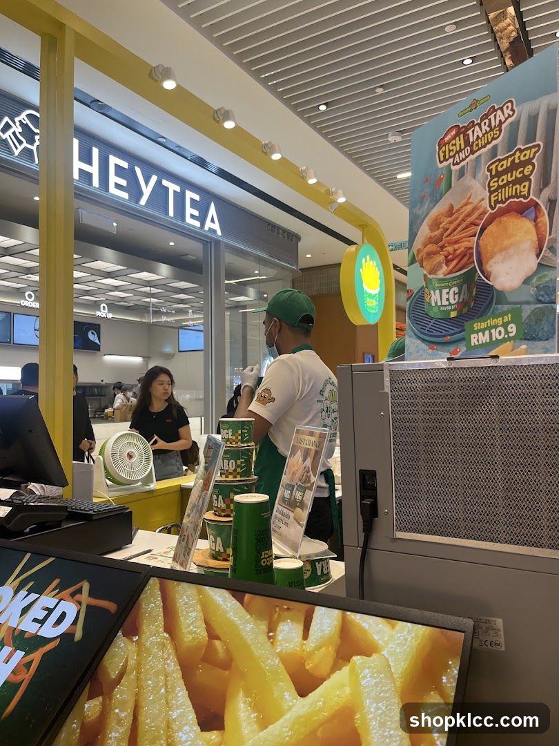 Food stall with promotional posters