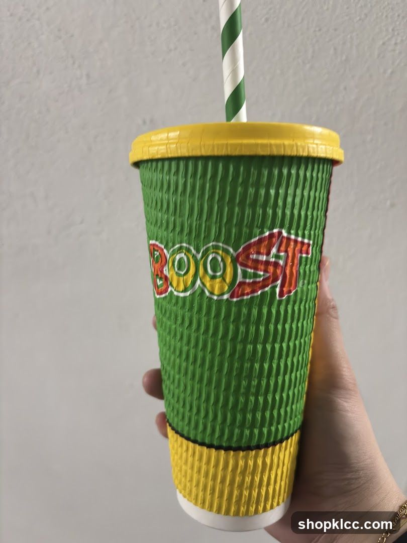 Boost Cup with Green and Yellow Design
