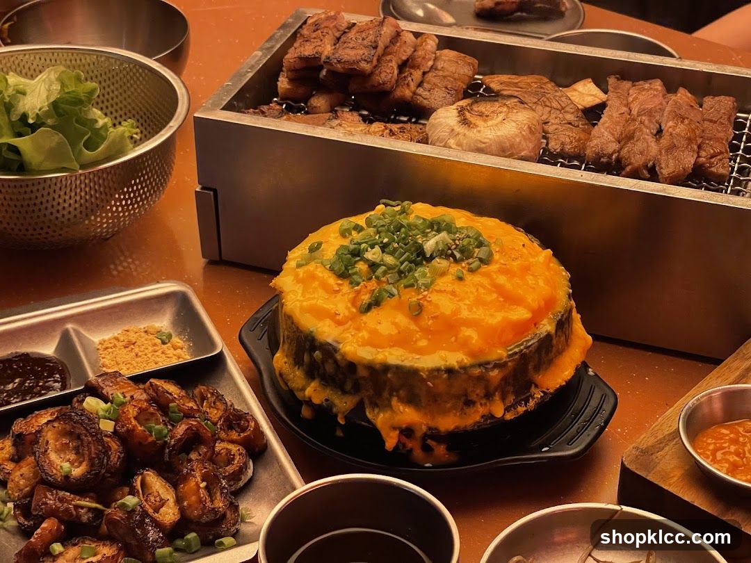 Table with Korean BBQ and Cheese Dish