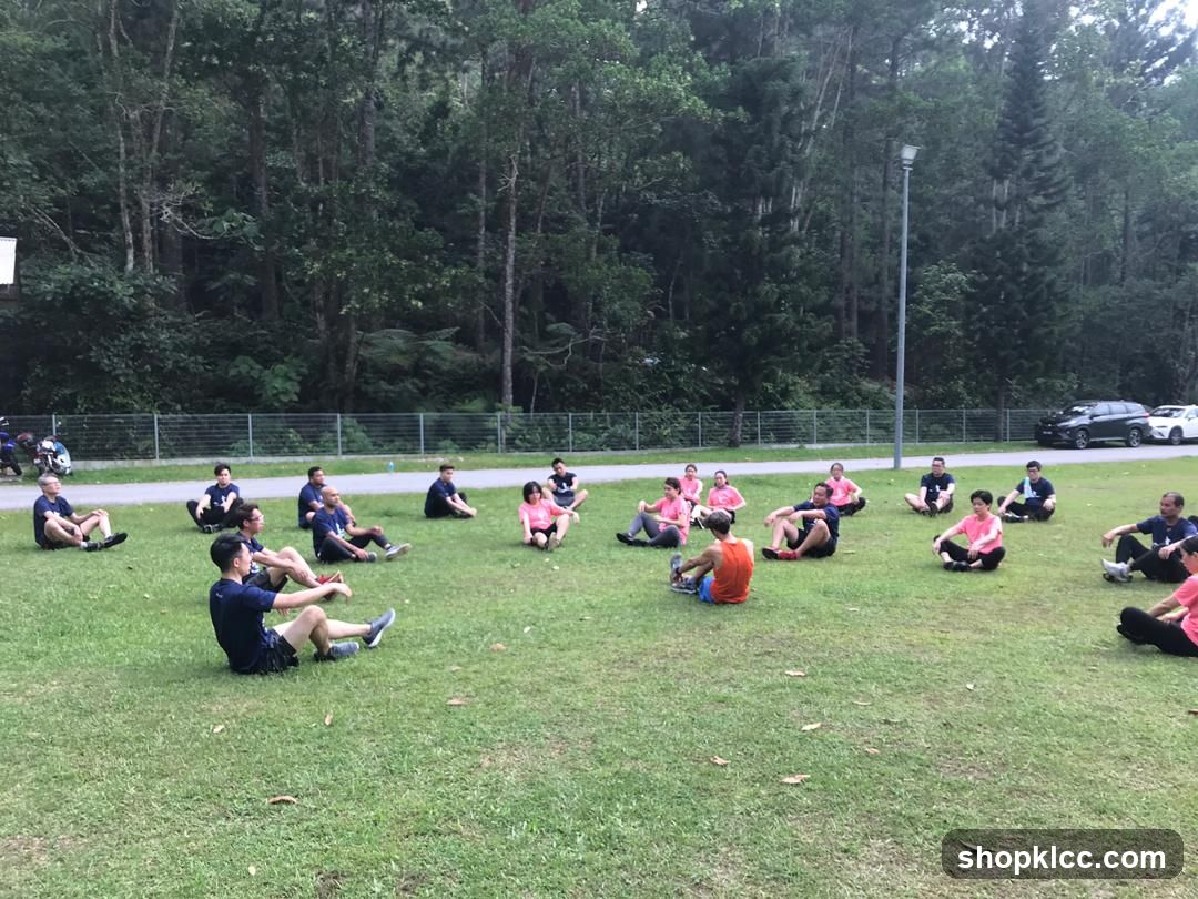Group sitting on grass in park