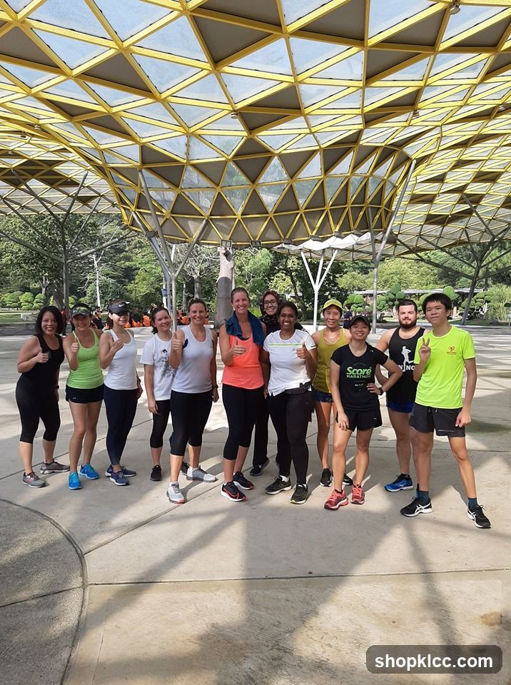 Group of people under a yellow canopy structure