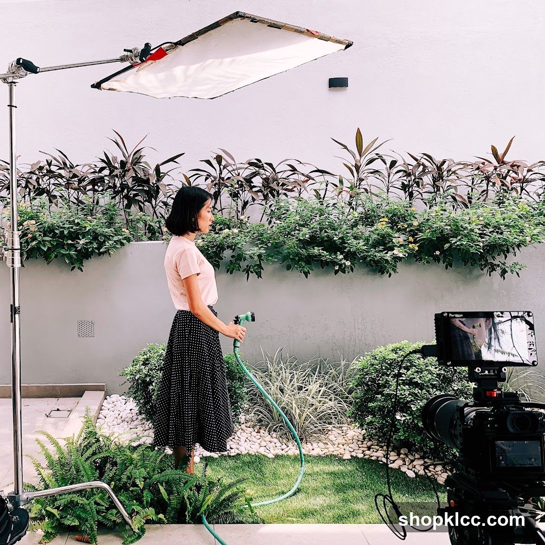 Outdoor Photoshoot with Garden Hose