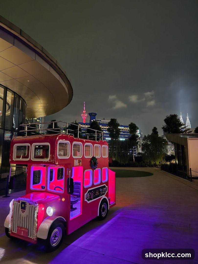 Red Double-Decker Bus Display at Night