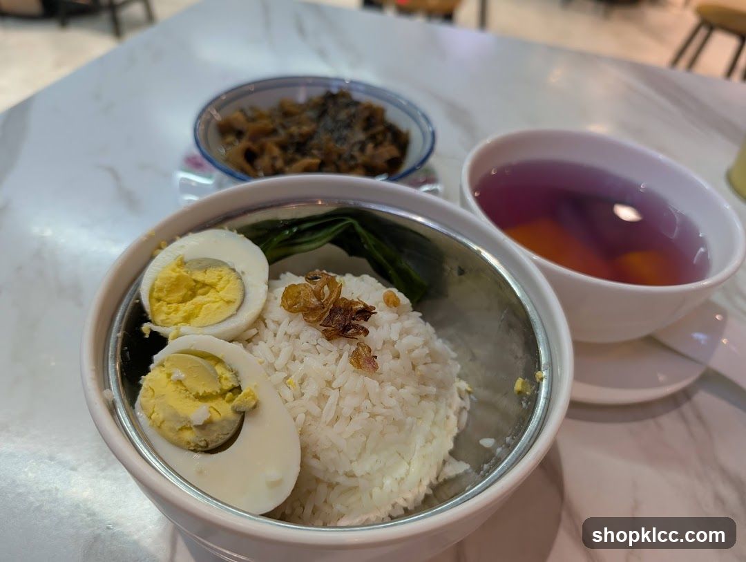 Bowl of Rice with Egg and Side Dishes