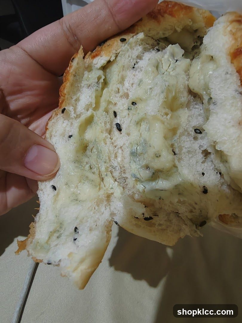 Close-up of a cheese-filled bread roll