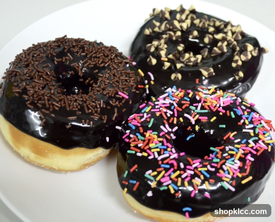 Three Chocolate Frosted Donuts