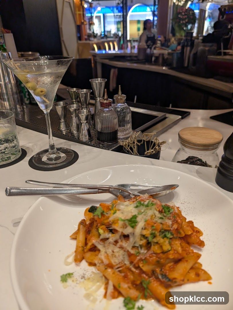 Pasta and Martini at a Bar