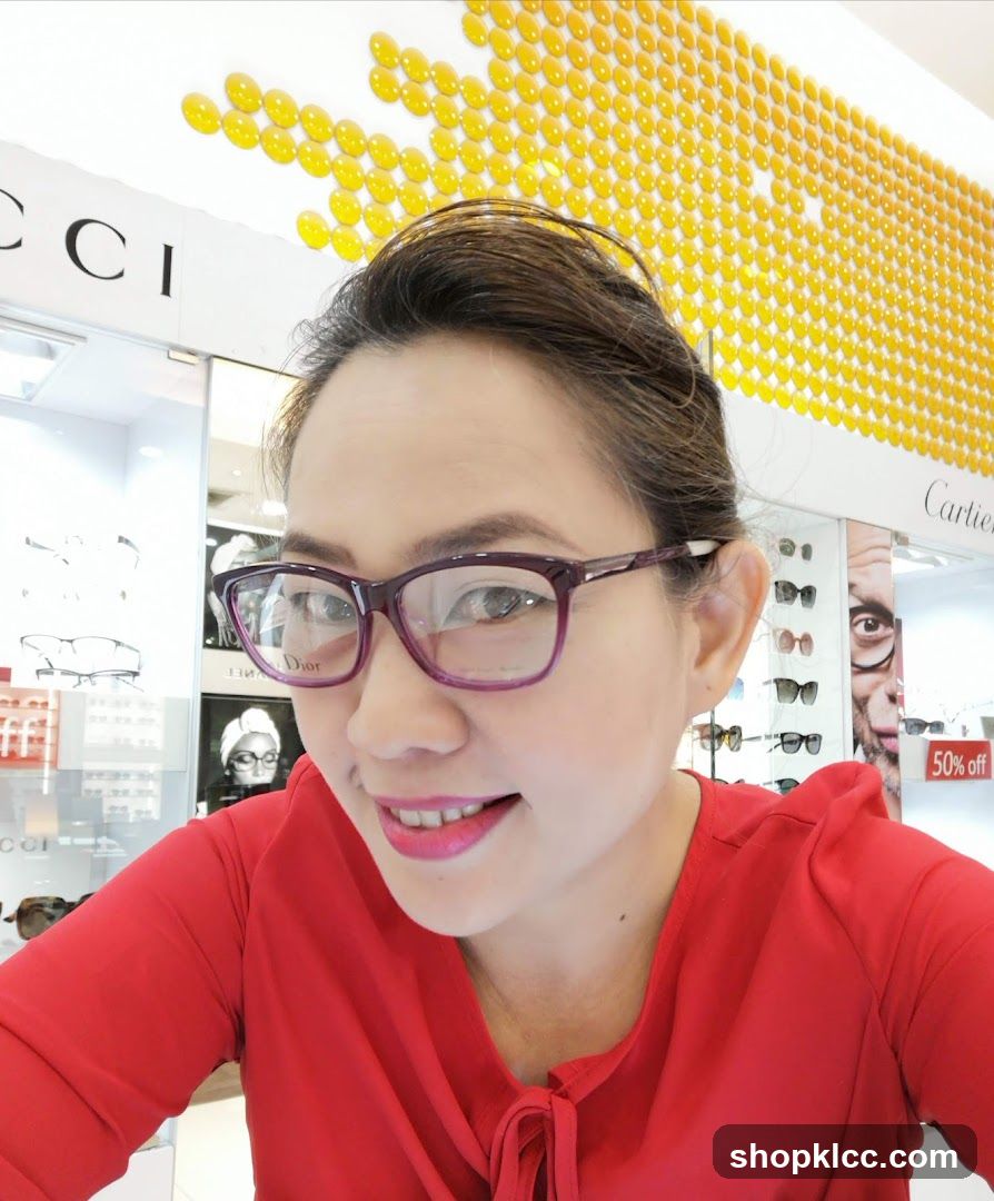 Woman wearing glasses in optical store