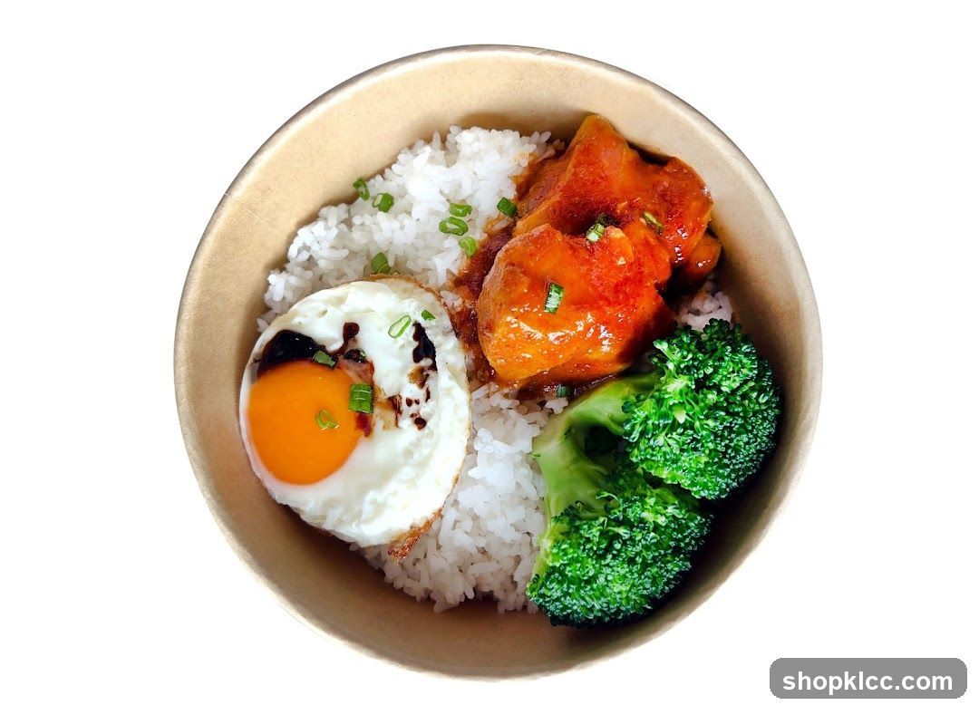 Bowl of Rice with Fried Egg, Broccoli and Meat