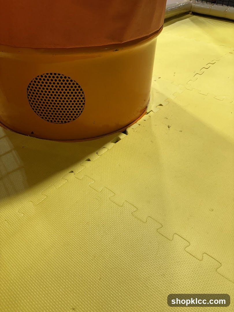 Yellow foam mat with orange container