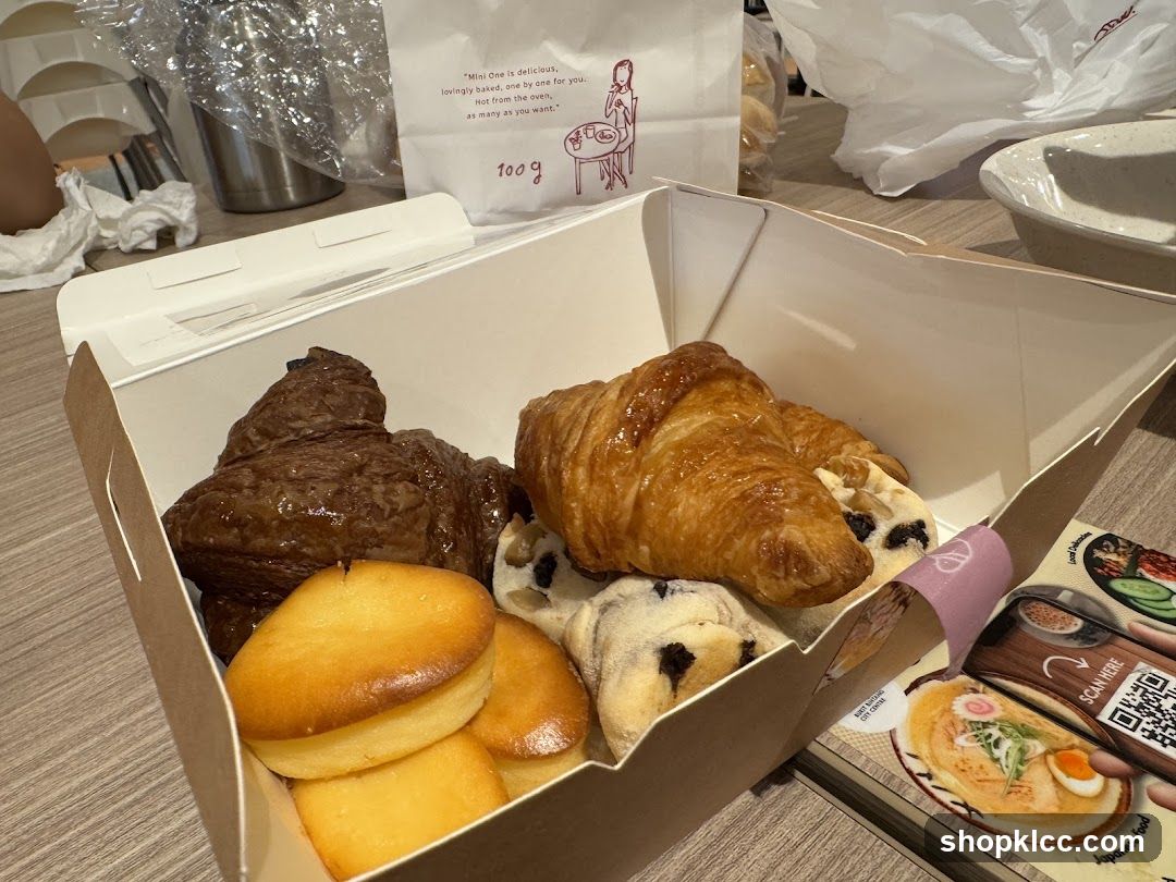 Pastry Box with Croissants and Buns
