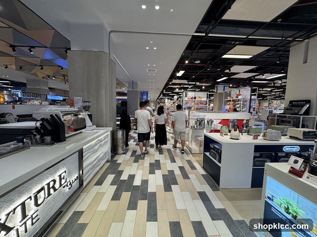 Interior of a retail store with appliances and a coffee counter