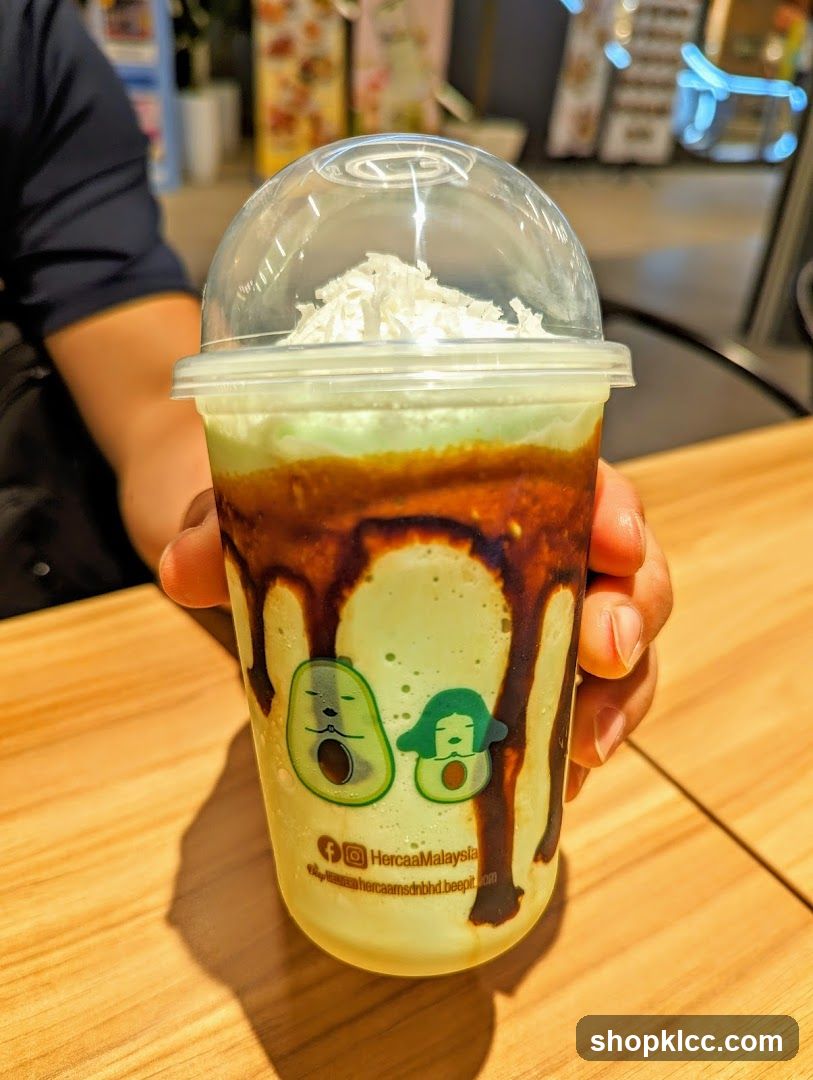 Avocado-themed drink with chocolate drizzle