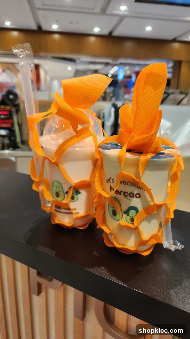 Avocado-themed drinks with orange packaging