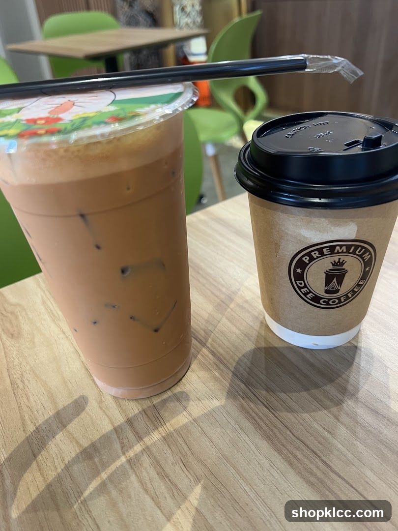 Coffee and Iced Drink on Table