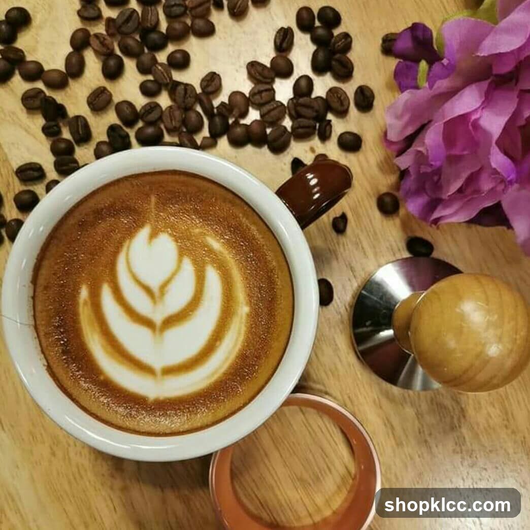 Latte Art Coffee Cup with Beans and Flower