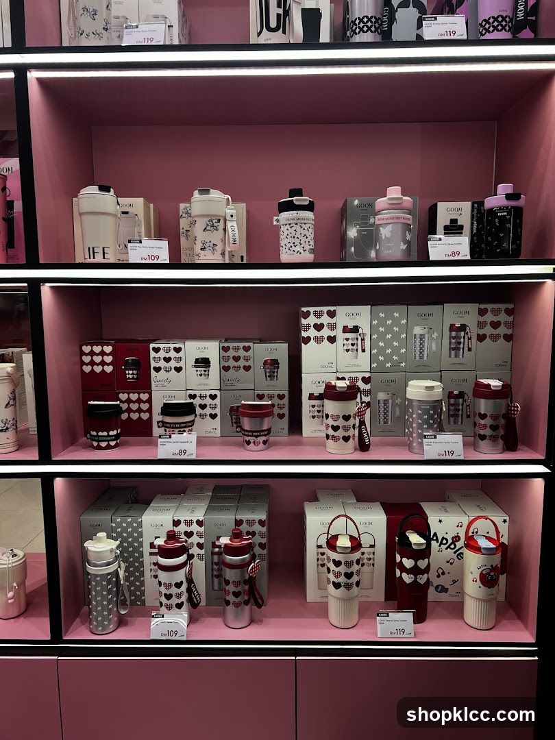 Pink Shelves with Thermos Cups and Bottles