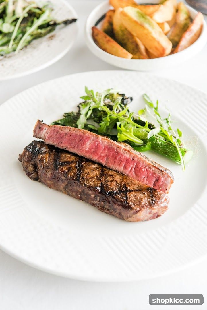 Grilled Steak with Salad and Fries