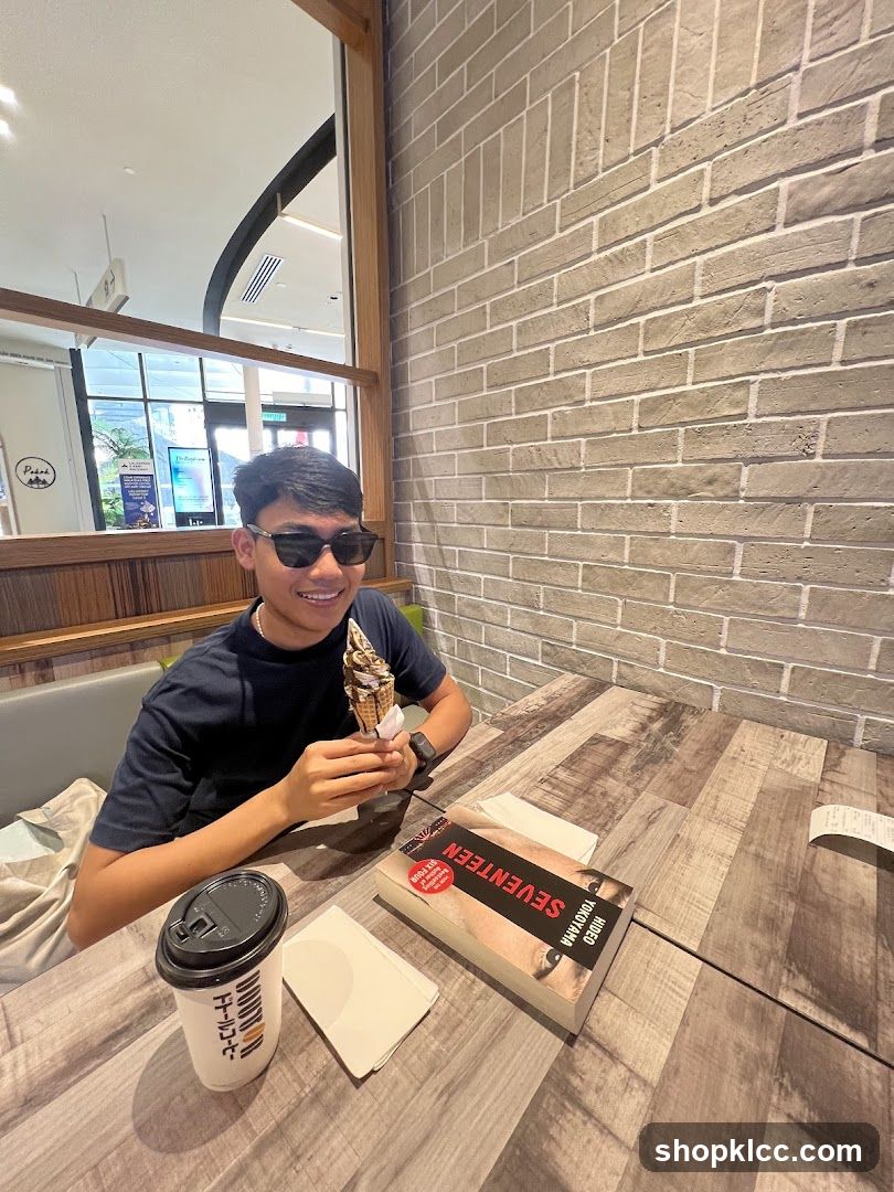 Man with Ice Cream and Coffee