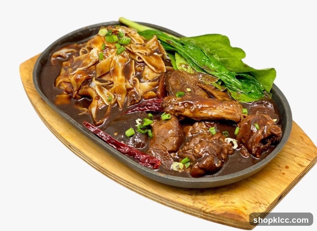 Sizzling Noodles with Meat and Greens