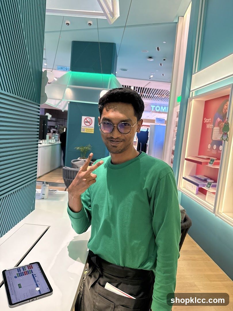 Man in Green Shirt Posing in Store