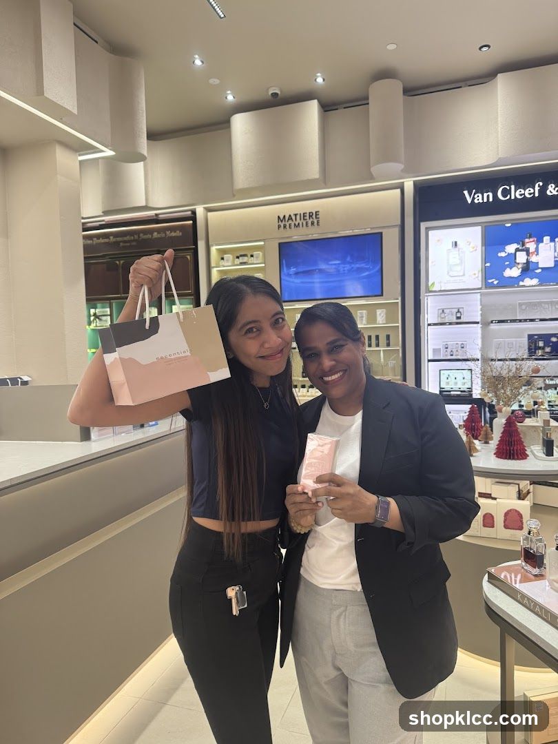 Two Women Posing with Shopping Bags in a Store