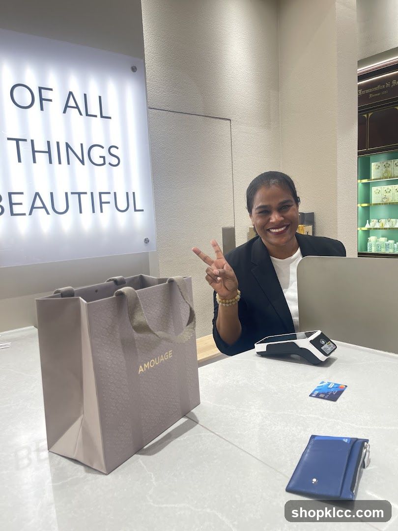 Woman at Counter with Shopping Bag