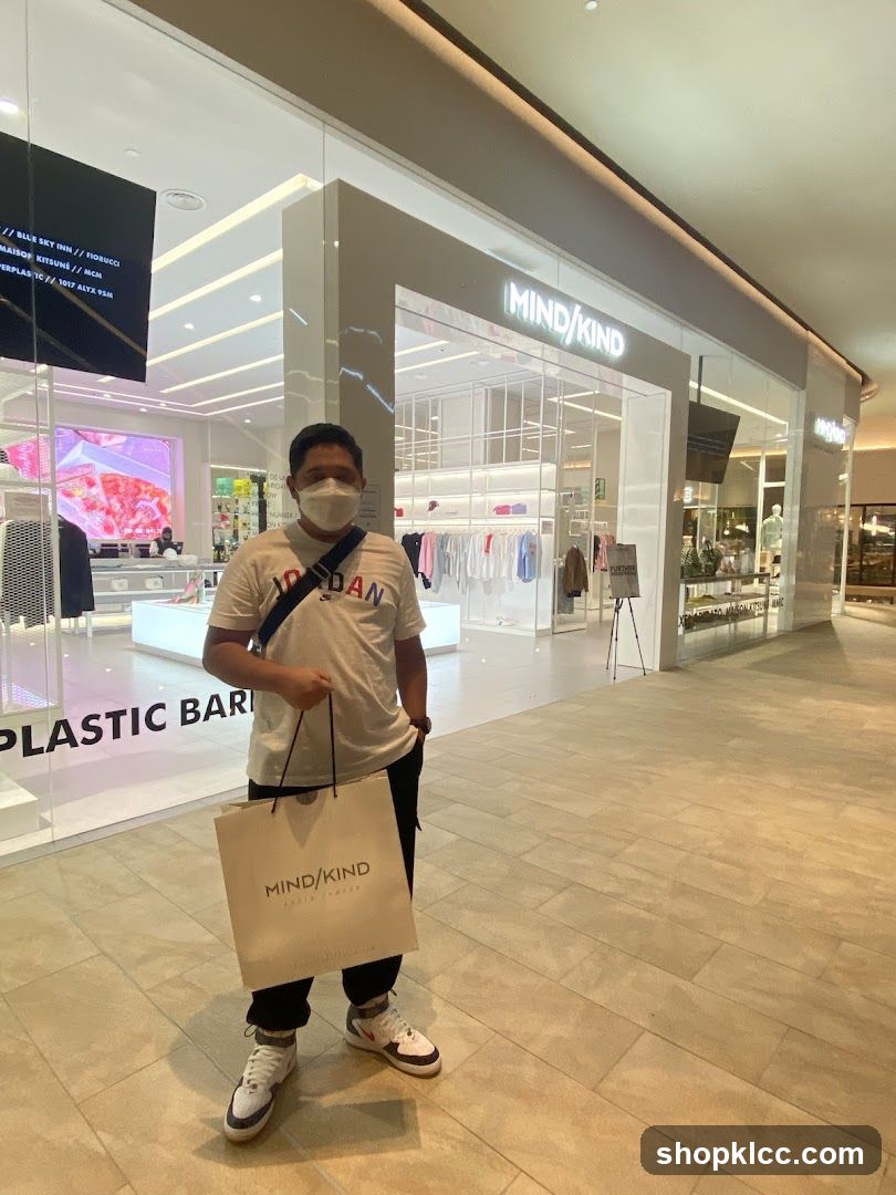 Person with shopping bag in mall
