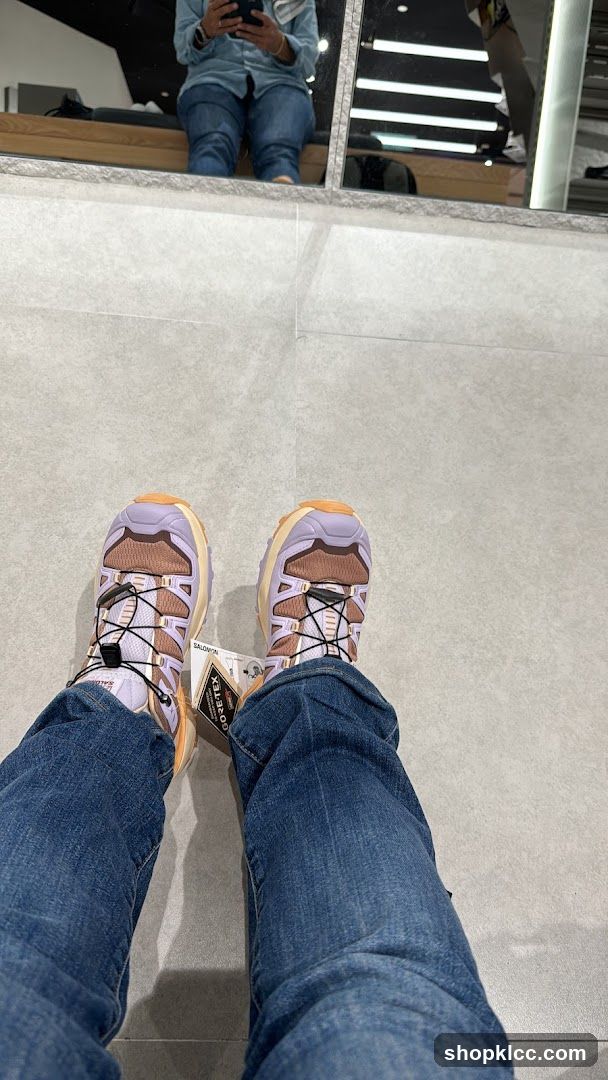 Person wearing Salomon shoes
