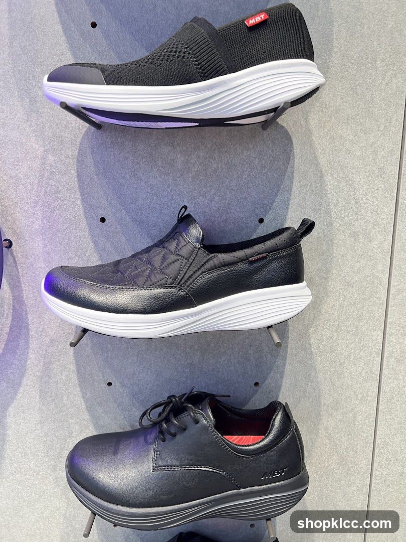 Three pairs of MBT shoes