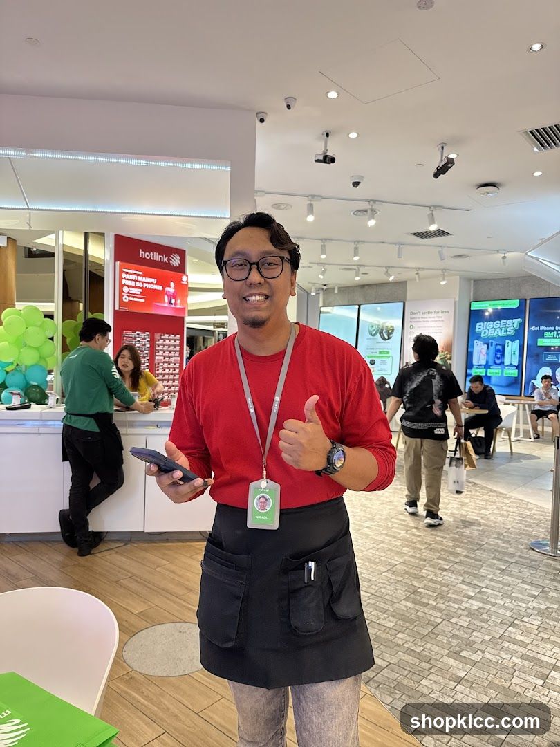 Store employee giving a thumbs up