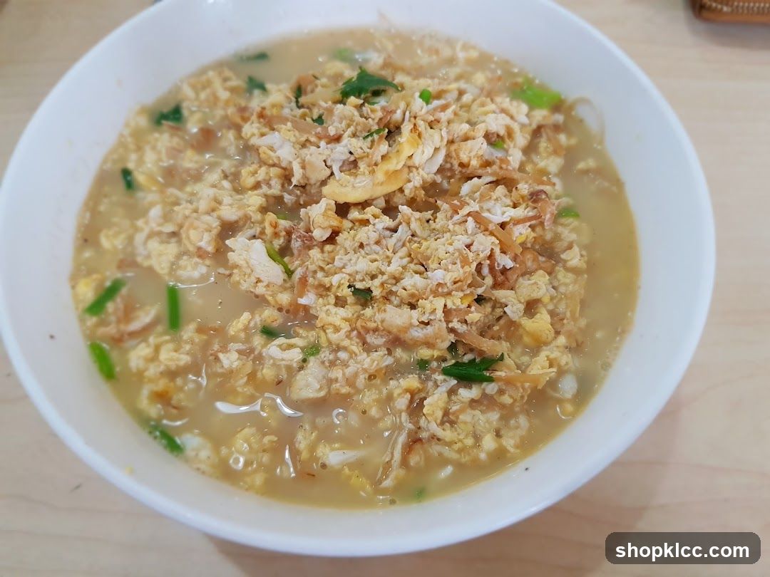 Bowl of Egg Noodle Soup with Scallions