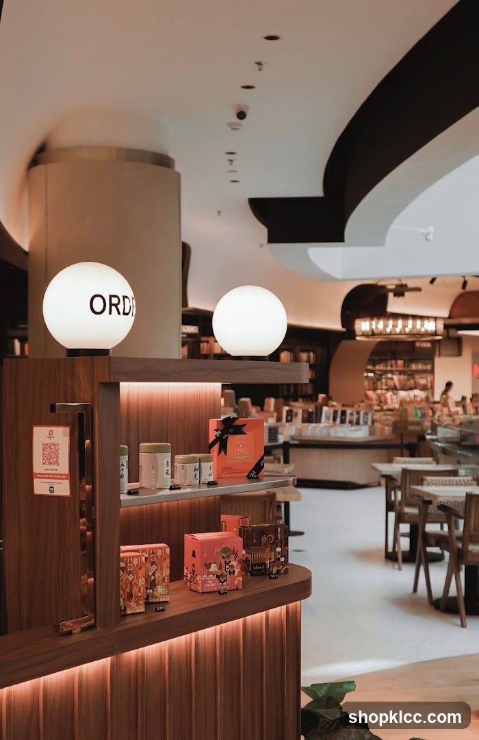 Interior of a store with display shelves and seating area