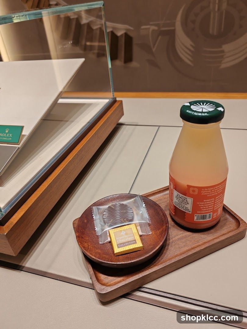 Beverage and chocolates with Rolex display