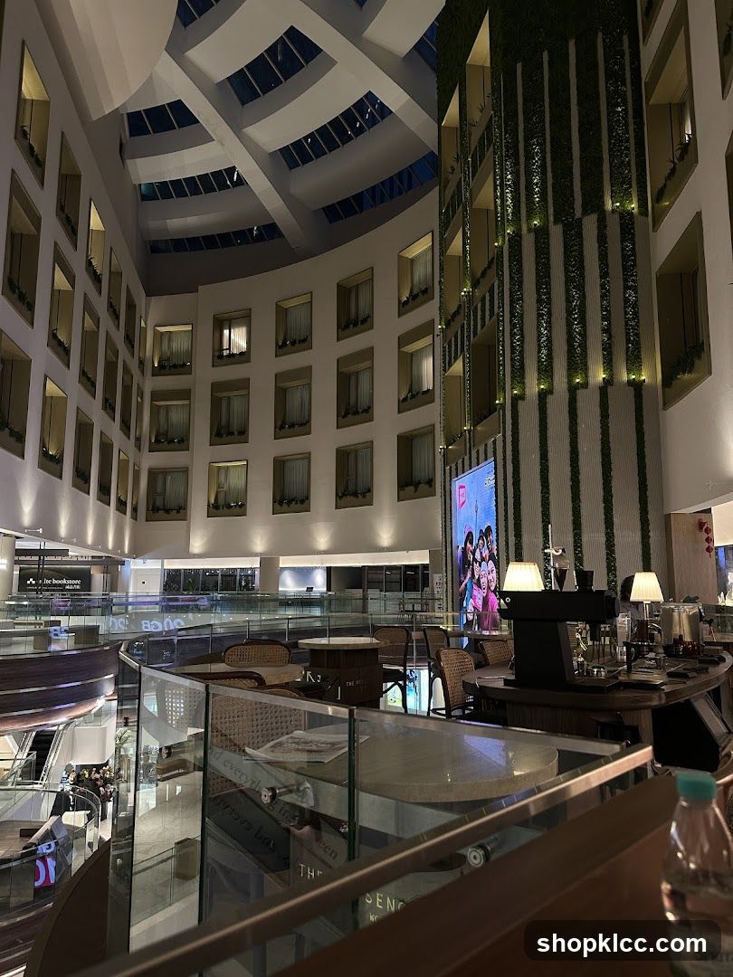 Interior of a modern atrium with a cafe