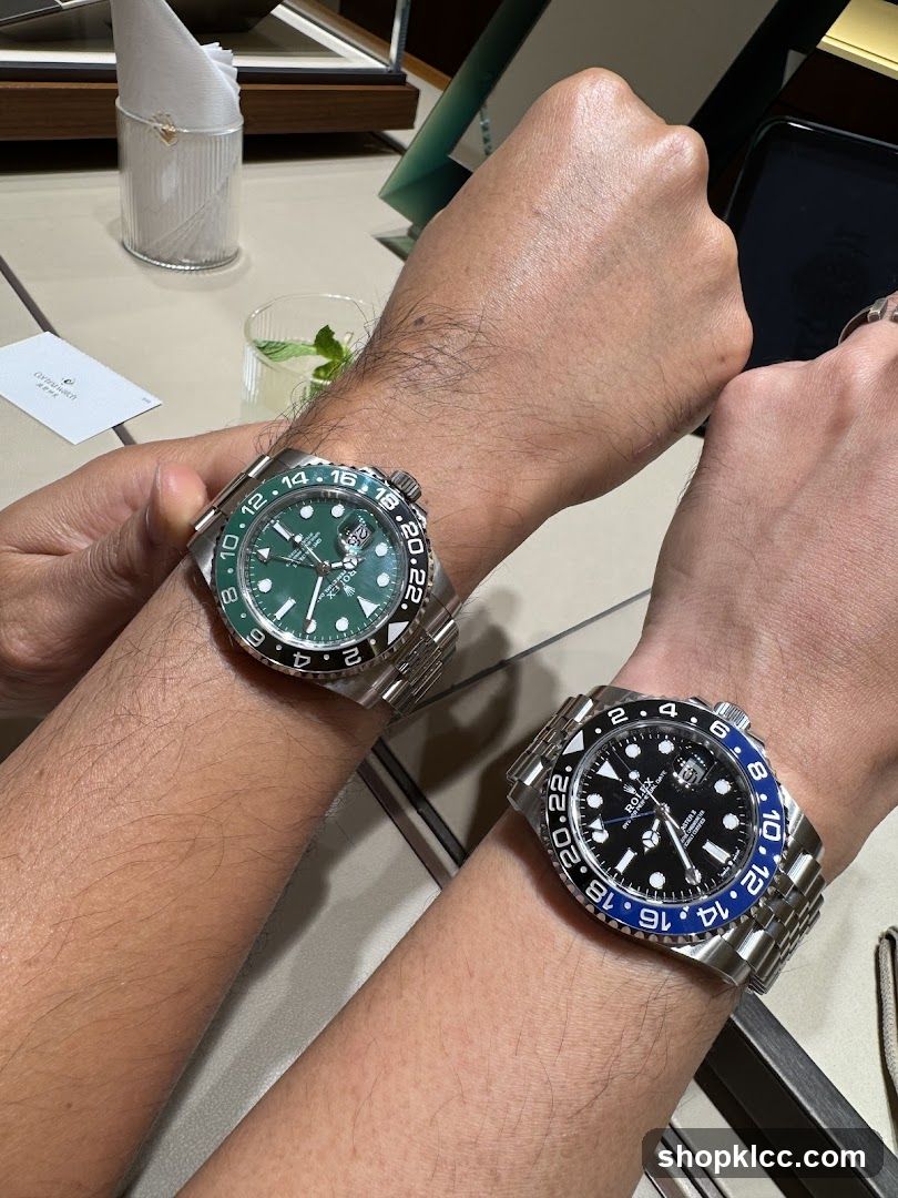 Two watches on wrists