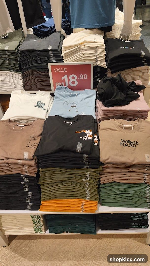 T-shirt display with sale sign