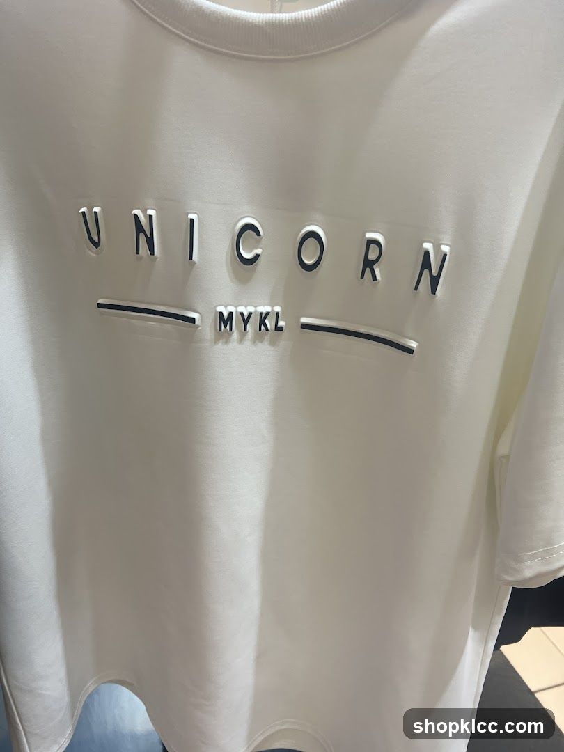 White T-shirt with "UNICORN MYKL" text