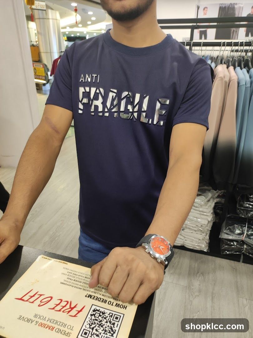 Man in T-shirt with "Anti Fragile" print