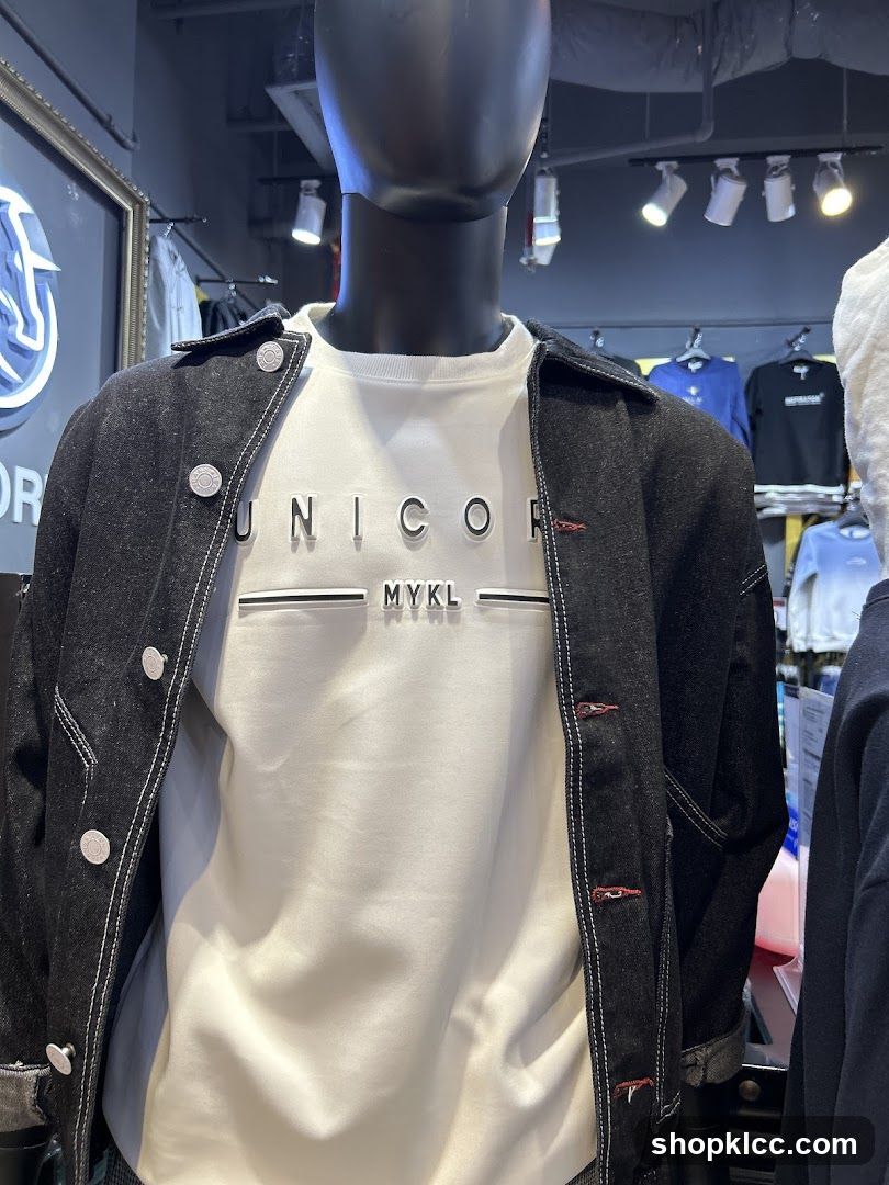 Mannequin wearing a denim jacket and white t-shirt